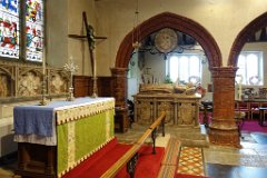 Ingatestone -SS Edmund & Mary - Interior  Looking across the altar into the 1556 south chapel. Between the chancel and the chapel lies an alabaster memorial to William, 2nd Lord Petre 1573 - 1637. : Church, Essex, Ingatestone, St Edmund, St Mary, Norman, Tudor, Medieval, C13, C15, C16, Arcade, Interior, Altar, Petre, Monument