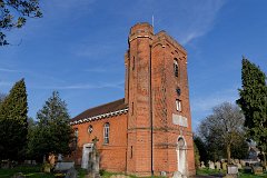 Ingrave - St Nicholas  Not many churches were built in the 18th century. St Nicholas's was built in 1734, commissioned by the 8th Lord Petre of Thorndon Hall as replacements for the medieval churches in West Horndon and Ingrave.  It lies in an octagonal plot - a design echoed in the original landscaping designs of Thorndon Hall, with it's 'west' tower actually facing south-southwest.  Octagonal turrets either side of the brick tower rise above the arched parapet. The imposing tower has been likened to a municipal water tower. : Church, Essex, Ingrave, St Nicholas, C18, Petre