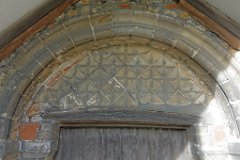 Little Tey - St James the Less - Doorway  Norman doorway wirh carved tympanum : Church, Essex, Little, Tey, St James, Norman, C12, C13, C16, Passion, Painting, Grade 1