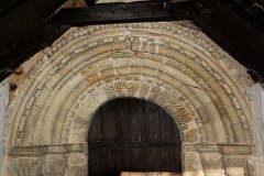 Little Totham - All Saints - Doorway  The Norman south doorway is magnificently carved and dates from 1160. The door itself is also Norman, held together with hand made iron nails and metalwork, and with a large sanctuary knocker which could be grasped by those wishing to use the church as a place of refuge. : Church, Essex, Little, Totham, All Saints, Grade 1, C12, C14, Norman