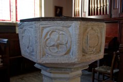 Little Yeldham - St John - Font  The  15th-century font is octagonal, with cusped panels enclosing a de Vere mullet (5-pointed star), roses, blank shields, and a four-leaf flower. : Church, Essex, Little, Yeldham, St John, C14, C15