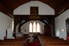 Little Yeldham - St John -15th C belfry timbers  At the west end of the nave,  15th century timber posts support cross-beams with arched braces, bearing the weight of the timber belfry, and its two bells said to be by Miles Graye, 1674 : Church, Essex, Little, Yeldham, St John, C14, C15