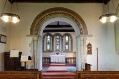 Sutton-Church-Essex-Chancel-Arch-Norman-carving.jpg