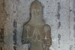Sutton Church, Essex - Brass  A medieval coffin lid is used to display the brass from the demolished church at Shopland, of Thomas Stapel, 1371,  in armour with sword, pointed bascinet and comail, as he would have worn at the Battle of Crecy. He was Sergeant-at-arms to King Edward III, ie one of the king's bodyguards. : Architecture, Church, Essex, Sutton, All Saints, C12, C14, Memorial, Brass
